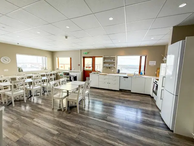 Shared kitchen and dining room at Við Hafið Oceanfront Guesthouse