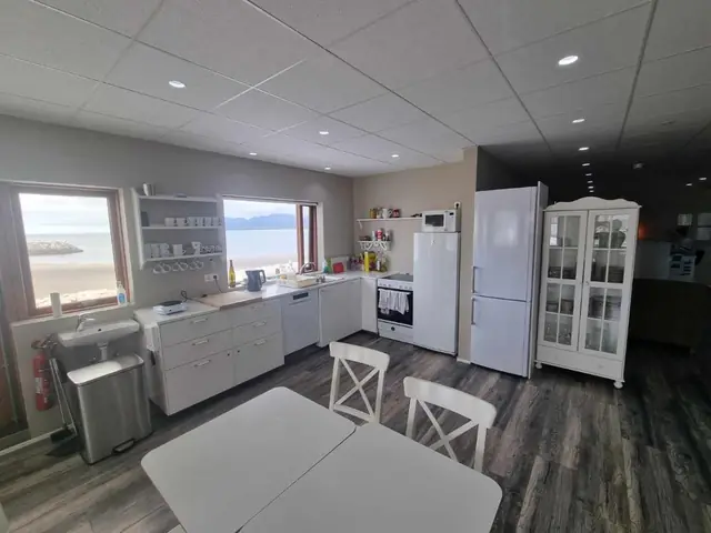 Equipped kitchen at Við Hafið Oceanfront Guesthouse